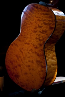 Quilted Maple Parlor Guitar with hand toned amber stain and Nitro Cellulose lacquer. © Jay Rosenblatt